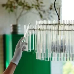 لوستر آویز شیشه ای ایکیا مدل  STOCKHOLM 2025، شیشه‌ای/برنجی، 54 سانتی‌متر