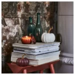 انواع شمع معطر در لیوان ایکیا مدل HOSTAGILLE ، رایحه کدو تنبل ادویه‌ای/قهوه‌ای