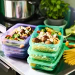 ظرف پلاستیکی ساندویچ درب دار ایکیا مدل PRUTA، یاسی/ سبز، ۲۲x۱۴x۵ سانتی‌متر